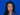 Bild zeigt Mandy Krahn vor blauem Hintergrund, lächelnd in die Kamera